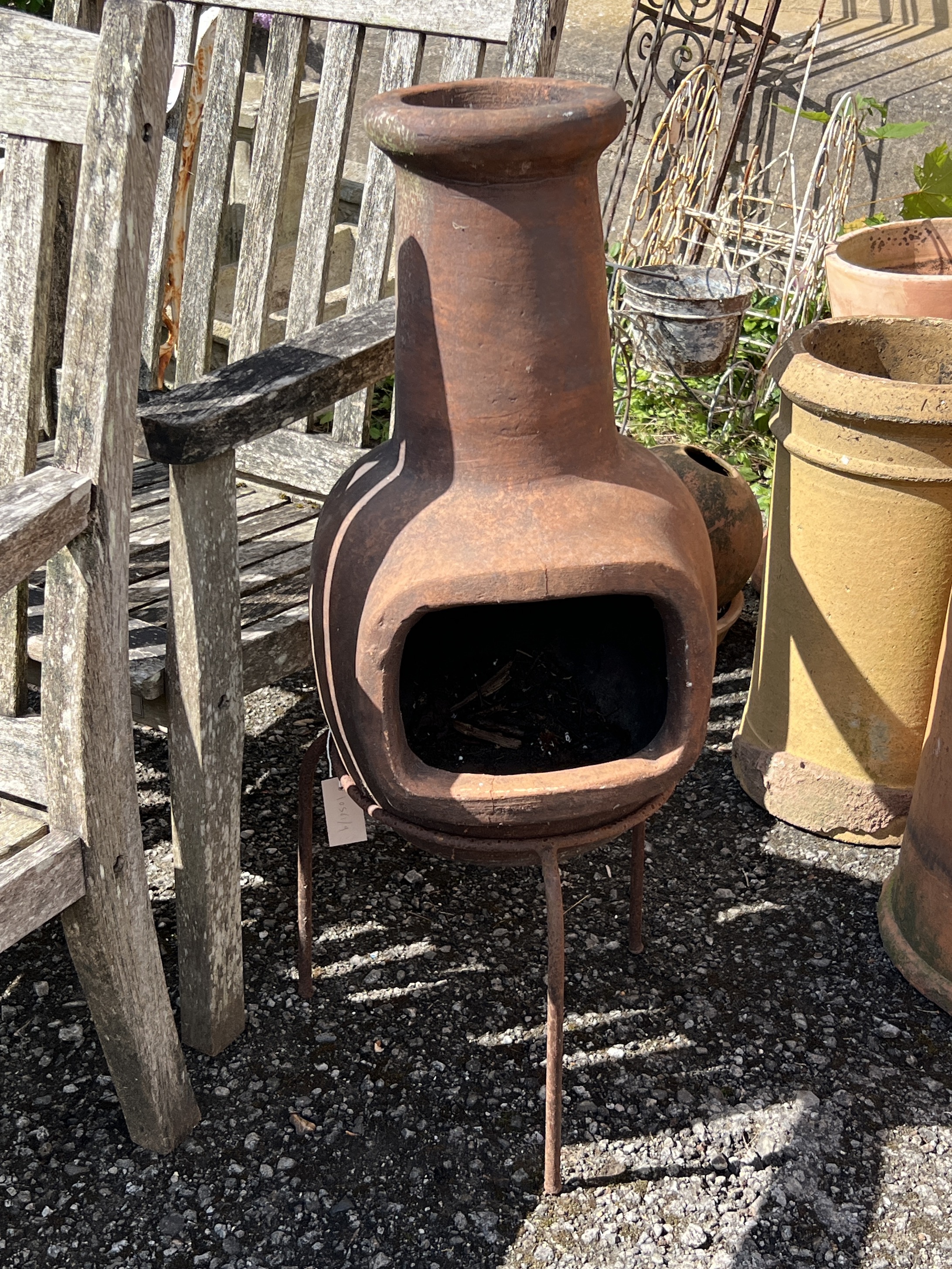 A chiminea on a stand, height 88cm